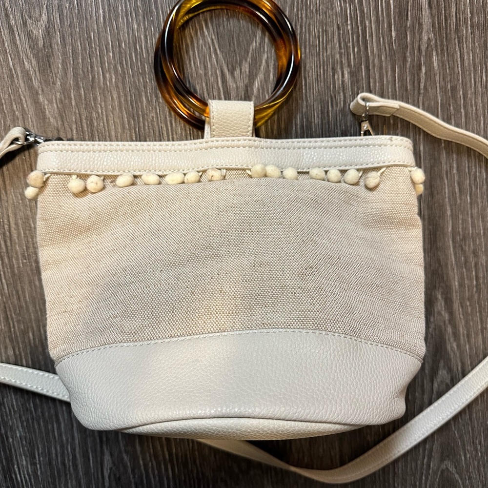 Shiraleah Tortoise Handle Pom Pom Mini Bucket Tote Linen/Cream - Picture 2 of 4